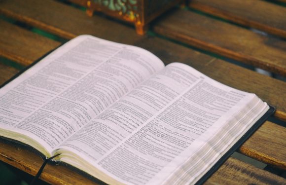 Bible lying open on a desk