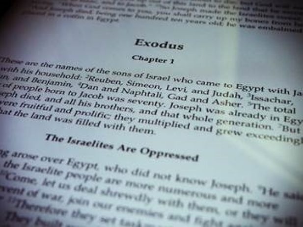 Bible open to Exodus 1