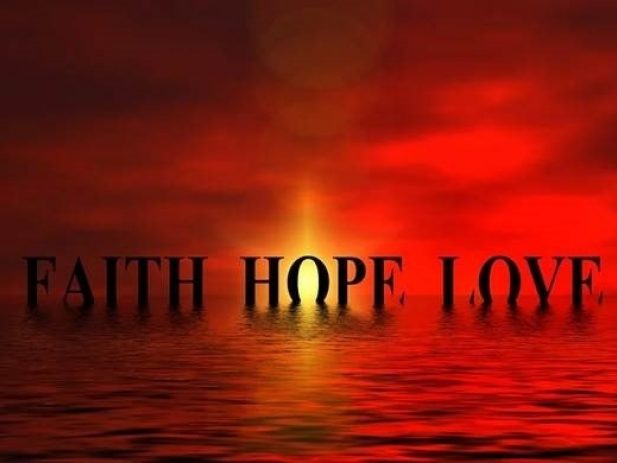 Red sunset with words faith, hope, love