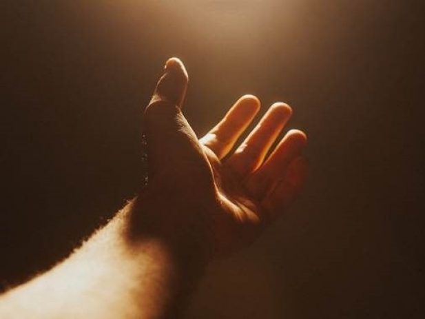 Hand lifted in worship