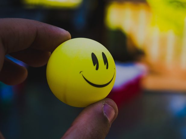 Some one holding a smile ball