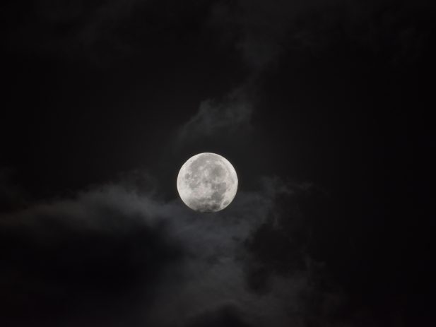 Dark sky with only the moon shining
