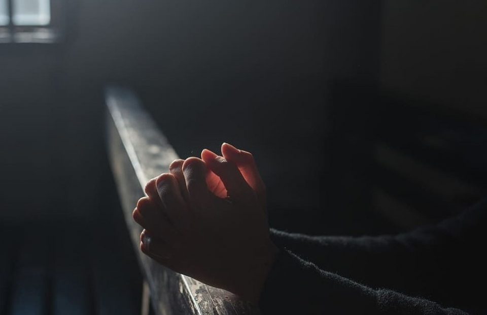 Praying Hands In Church